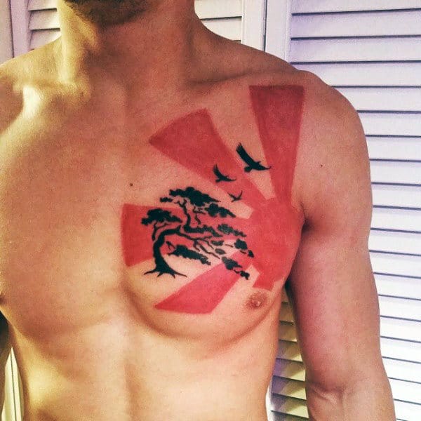 Awesome Black And Red Ink Guys Chest Tattoo Of Rising Sun With Bonsai Tree And Flying Birds