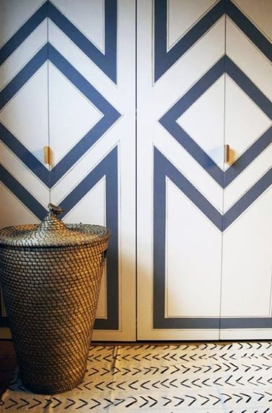 blue and white painted pattern closet doors