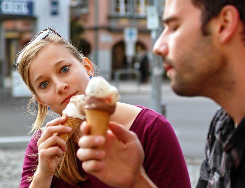 couple enjoy eating ice cream