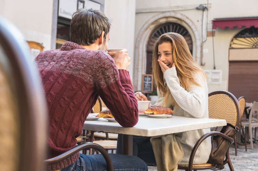 couple-talking-coffee-shop