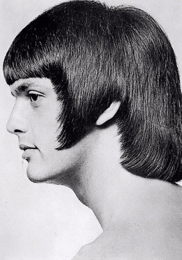 A 1960s men’s haircut featuring geometrical shapes styled around the ears and cheeks