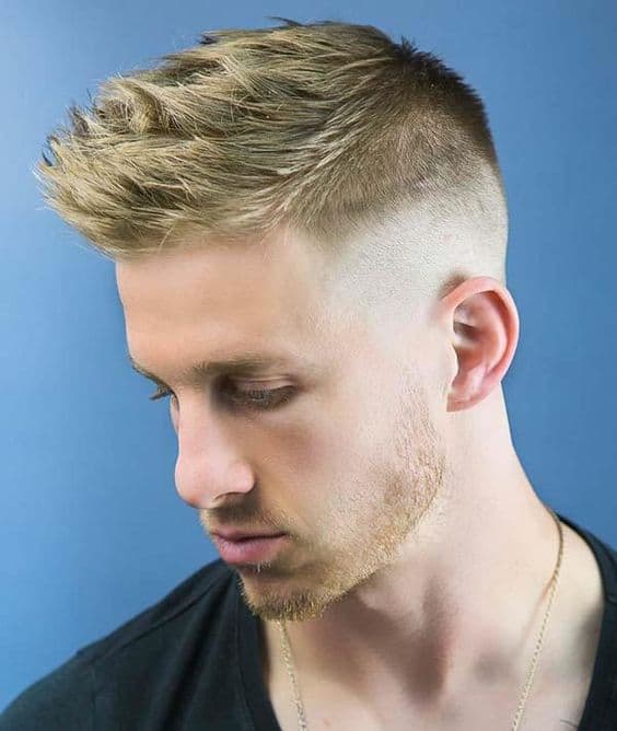 faux hawk bald fade with blond hair