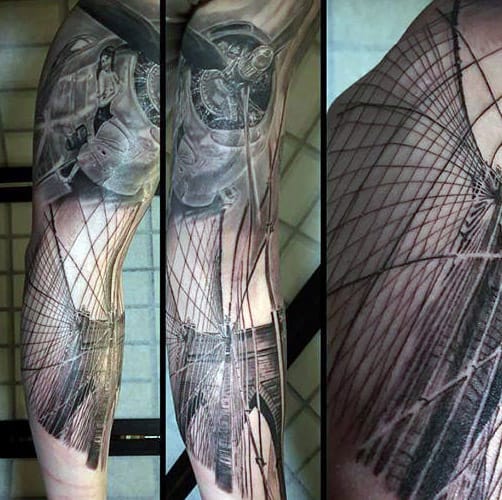 Guy With 3d Brooklyn Bridge Tattoo Design Sleeve