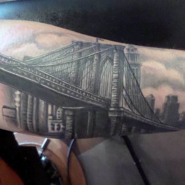 Guy With Brooklyn Bridge Forearm Tattoo