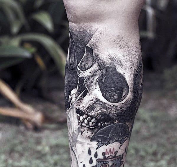 Guys Calves Interesting Skull Tattoo
