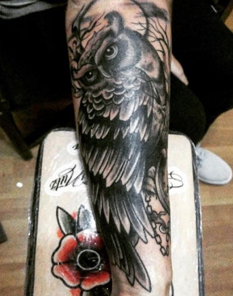 Guy's Celtic Owl Tattoo On Forearm
