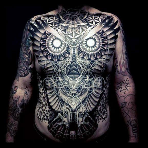 Guy's Owl Eyes Tattoo On Stomach And Chest