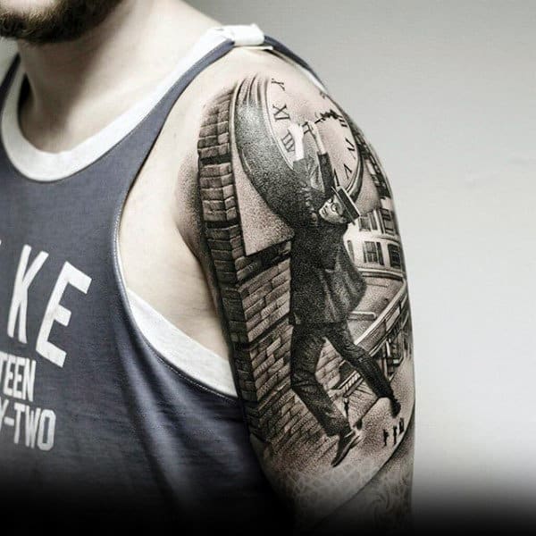 Interesting Tattoo Of Man Holiding On To Clock For Dear Life On Arm