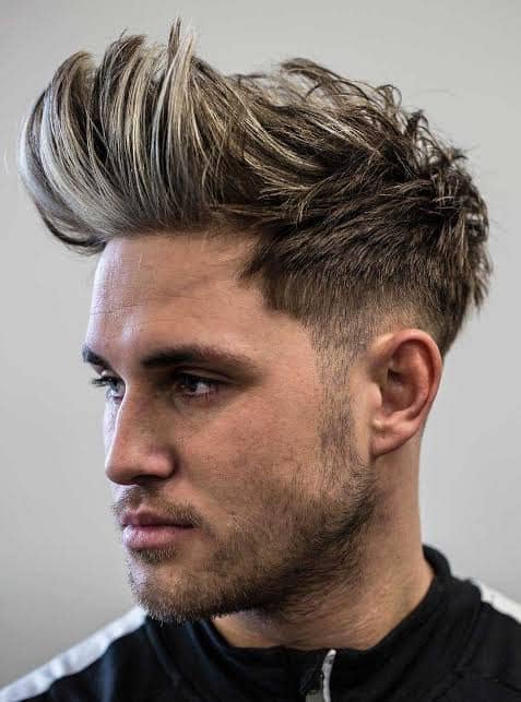 man with long fohawk hairstyle