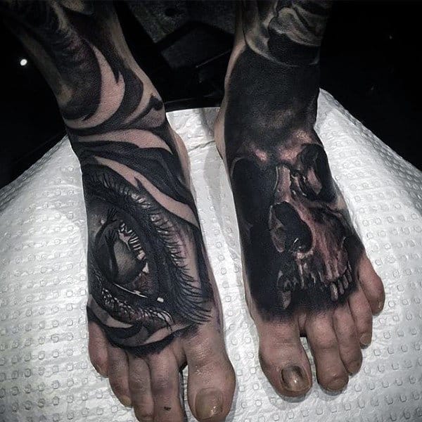Male Feet Interesting Tattoo Of Eye And Skull