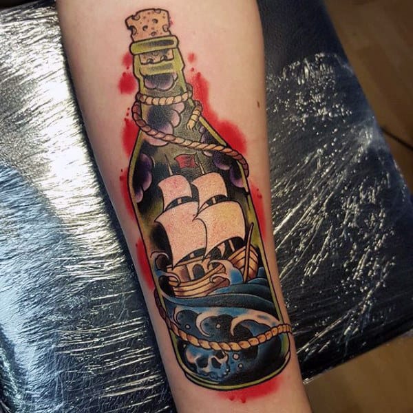 Male Forearms Intereting Tattoo Of Ship In A Bottle