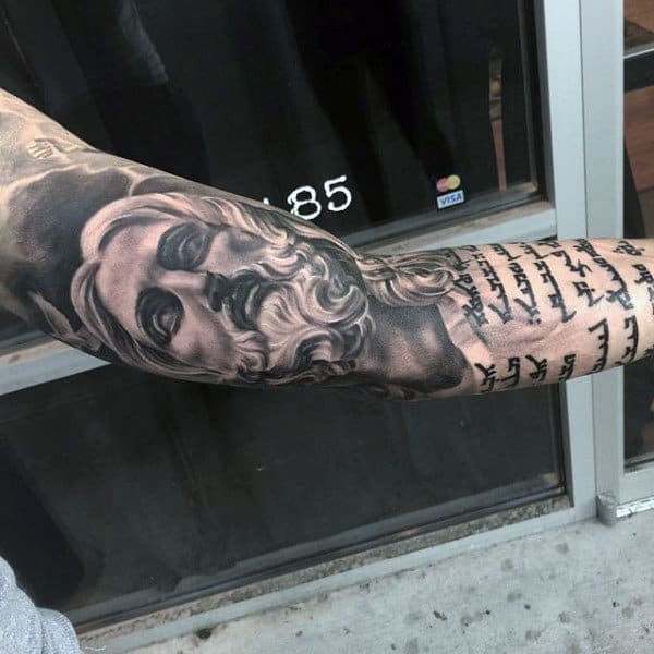 Male Full Sleeves Interesting Scripted Religious Tattoo Ideas