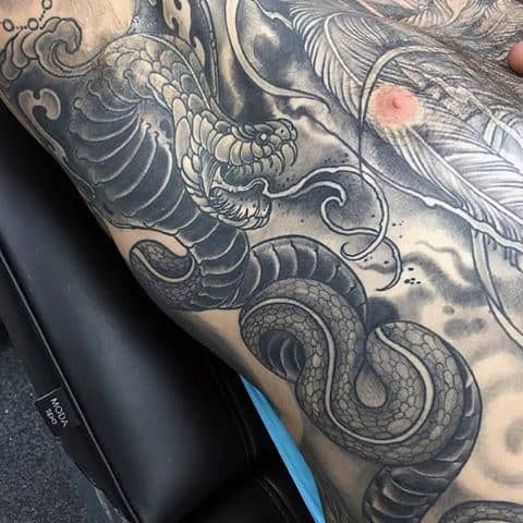 Male Torso Interesting Tattoo Of Oriental Dragon