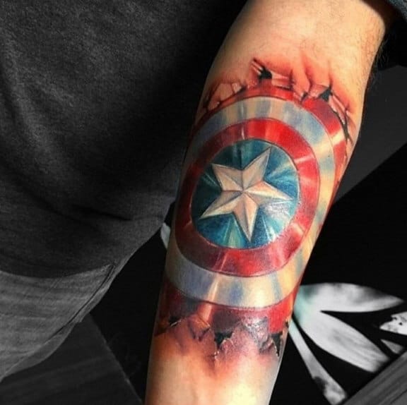 Male With 3d Ripped Skin Captain America Shield Tattoo Inner Forarem