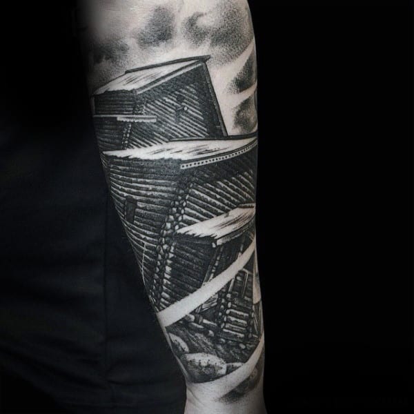 Man With Interesting Grey Blocks Tattoo Forearms