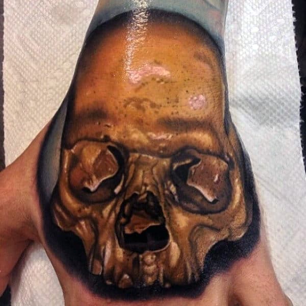 Mens Hands Interesting Golden Skull Tattoo