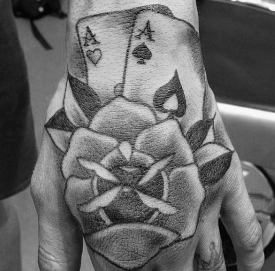 Old School Flower With Aces Playing Card Mens Hand Tattoo