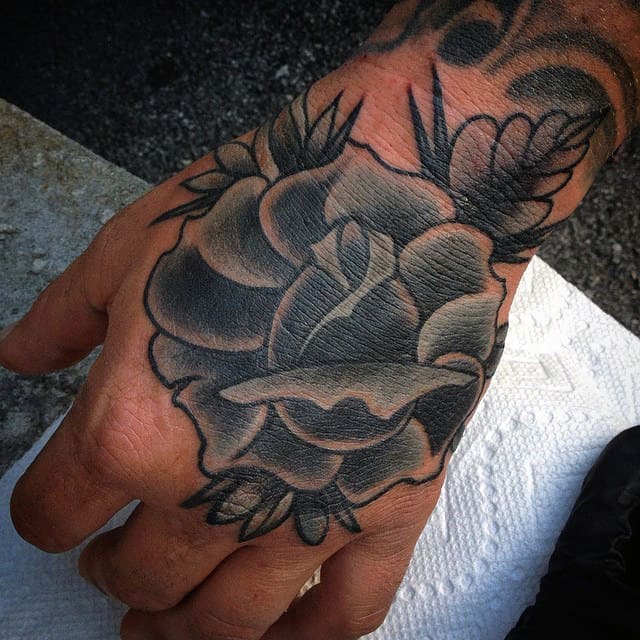 nextluxury hand 2 black and grey rose tattoos