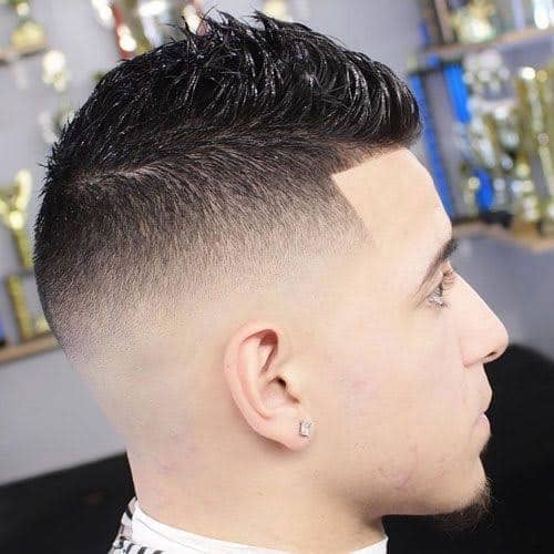 man with short fohawk hairstyle