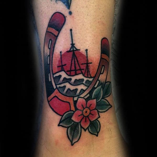 Sinking Ship With Horseshoe Guys Traditional Lower Leg Tattoo