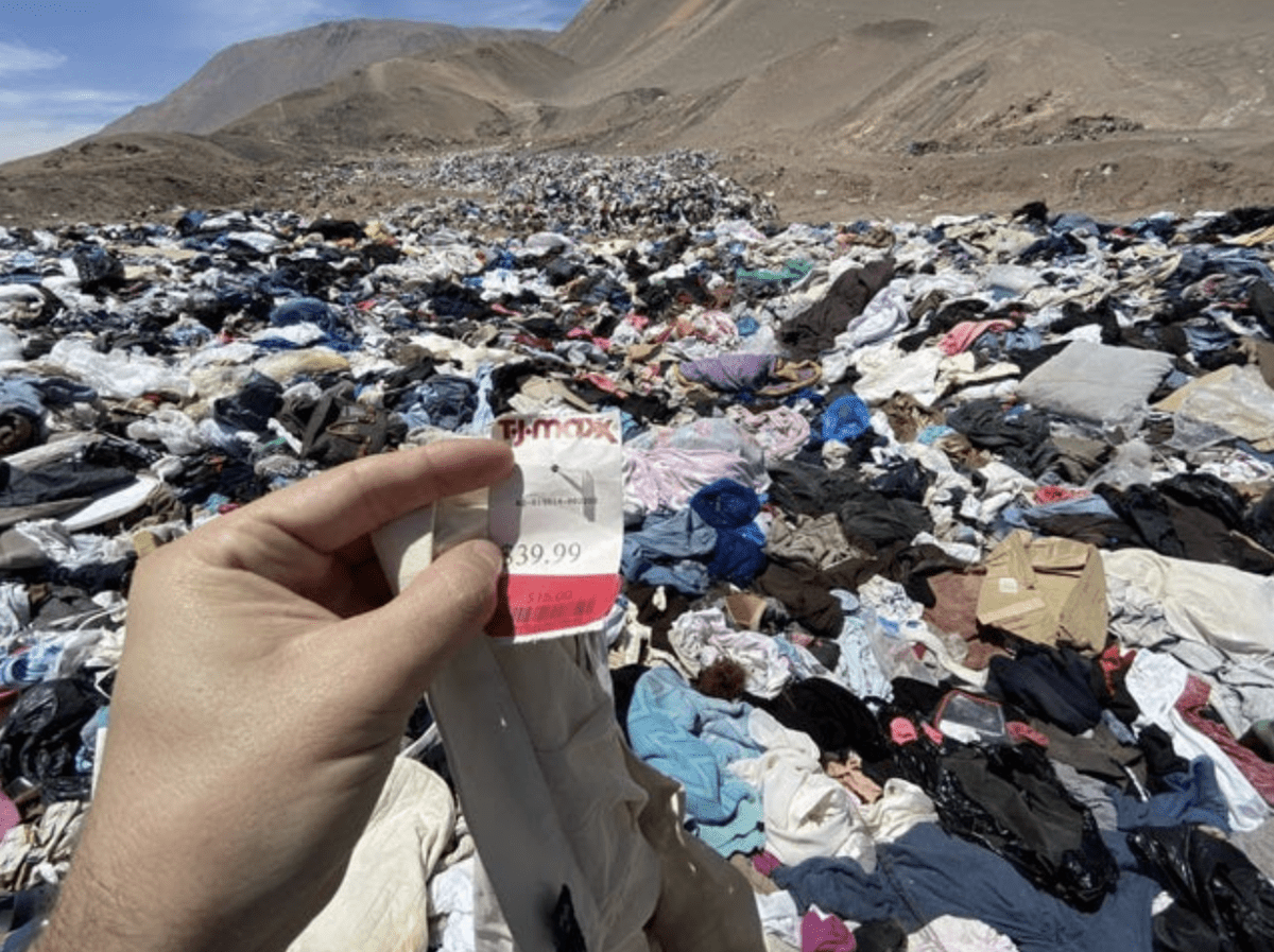 Landfill with clothes and clothing tags
